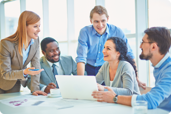executives-joking-laughing-office-1 executives-joking-laughing-office